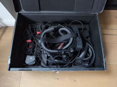 Valve Index VR headset with 2 knuckle controllers, 4 lighthouses, and 2 vive trackers