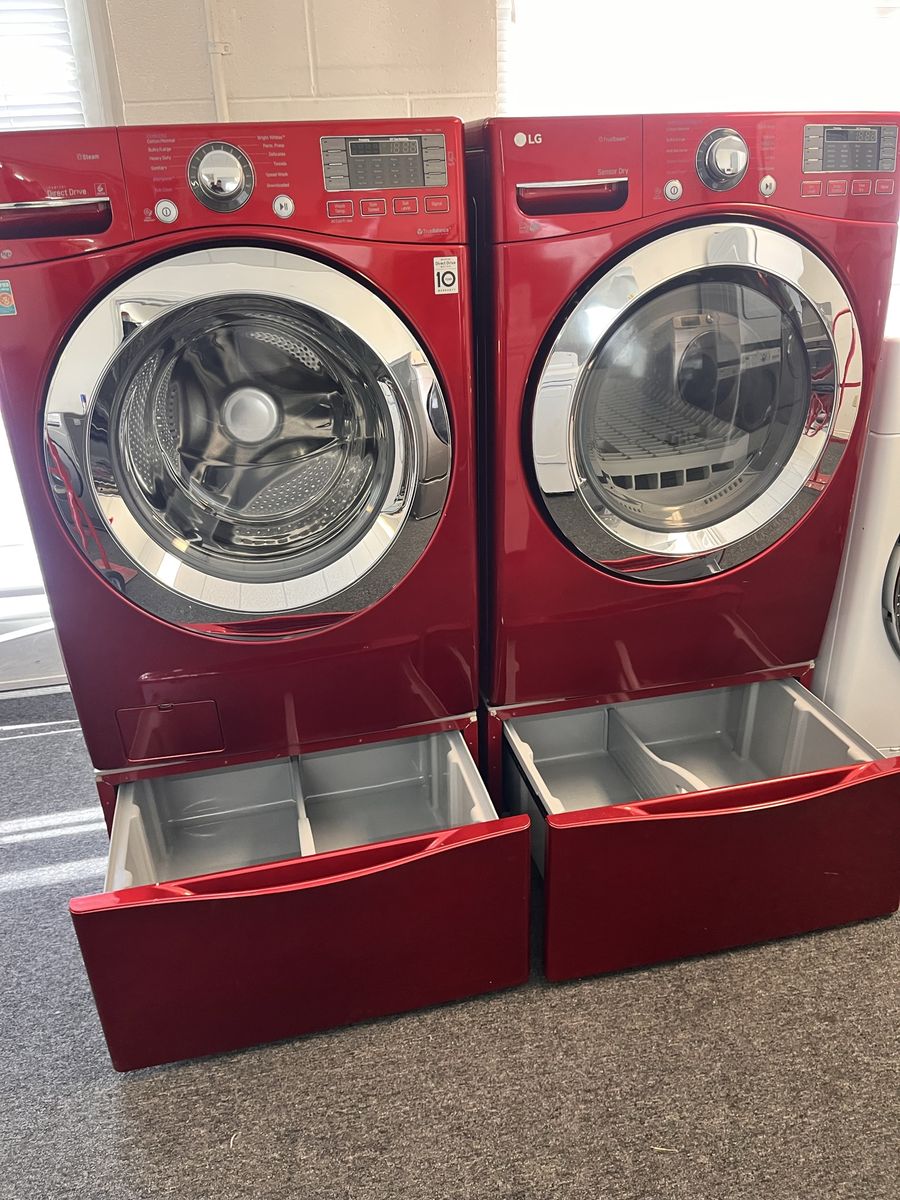 LG washer and dryer with pedestals and drying rack