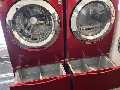 LG washer and dryer with pedestals and drying rack
