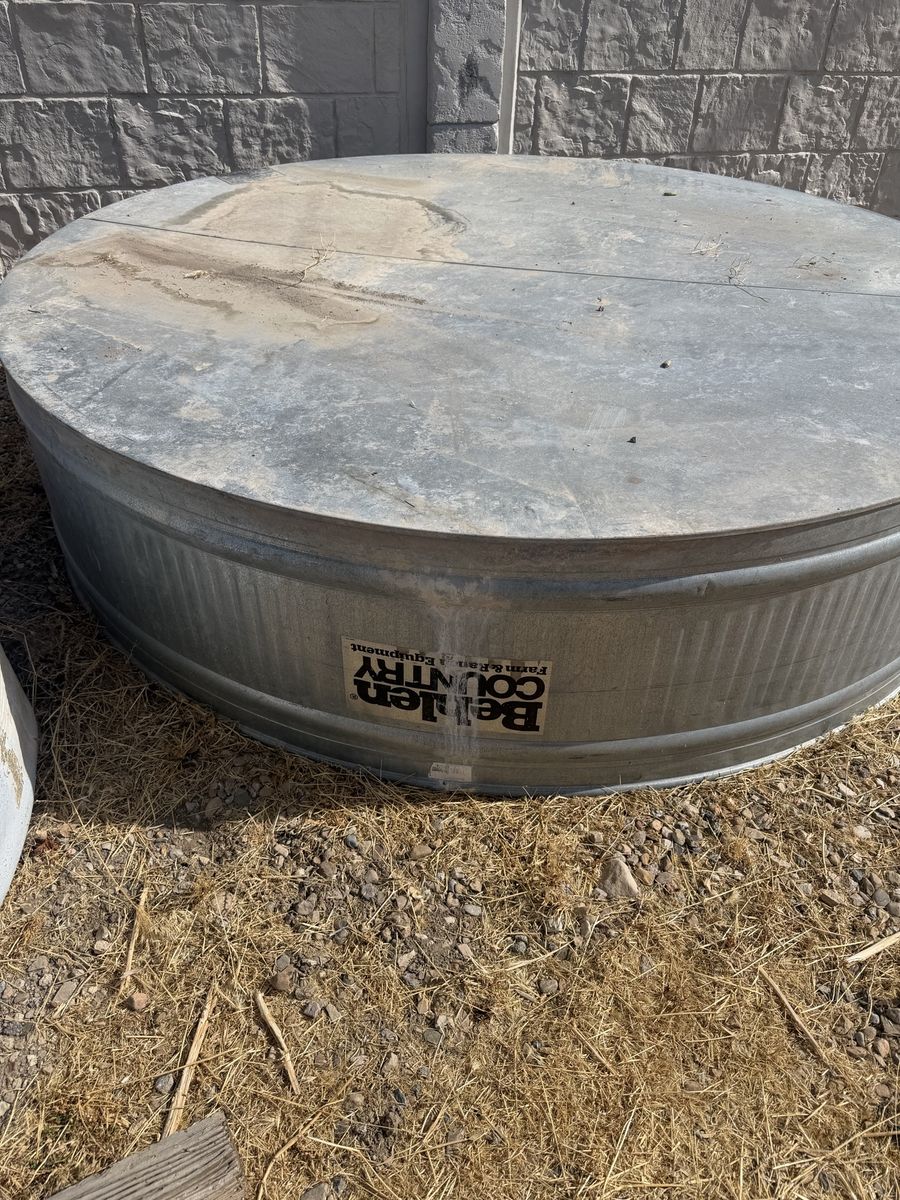 Behlen Country Galvanized Steel Round Stock Tank - 2 Feet Deep 8 feet across. Approximately 700 gallon. Located in Herriman. 