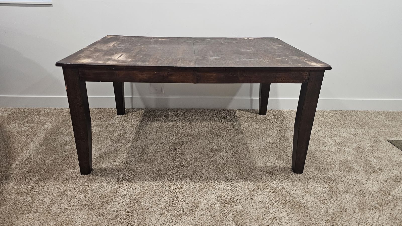 Solid wood dining table with 4 chairs for sale.