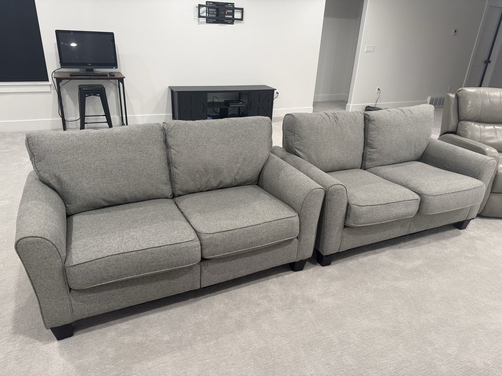 2 grey couches like new