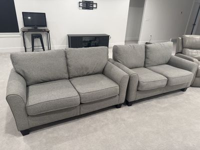 2 grey couches like new