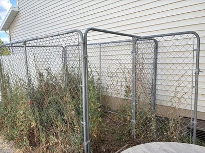 Used Outdoor Dog Run with Gate & 4 Extra Panels - Expandable Pet Enclosure