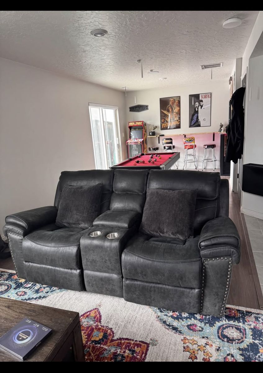 Reclining Loveseat with Center Console and Cup Holders