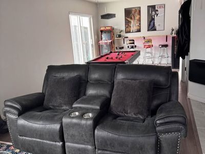 Reclining Loveseat with Center Console and Cup Holders