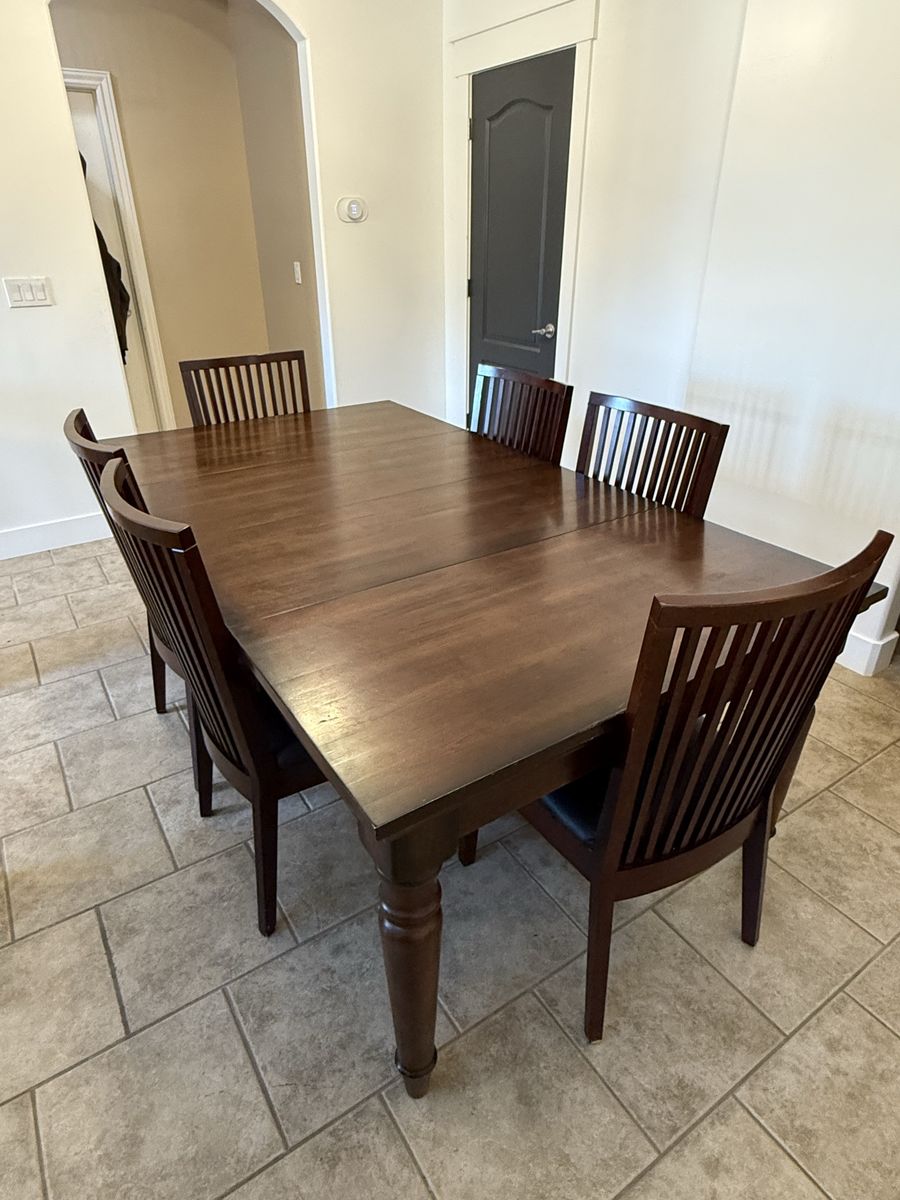 Dark wood extendable dining table 6 chairs
