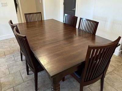 Dark wood extendable dining table 6 chairs