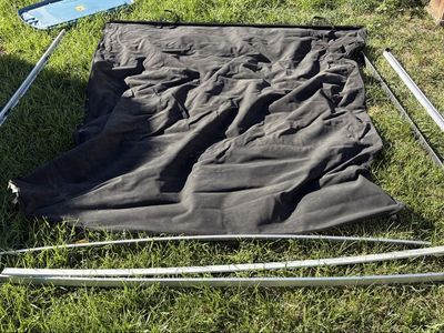Black soft tonneau truck bed cover with rails
