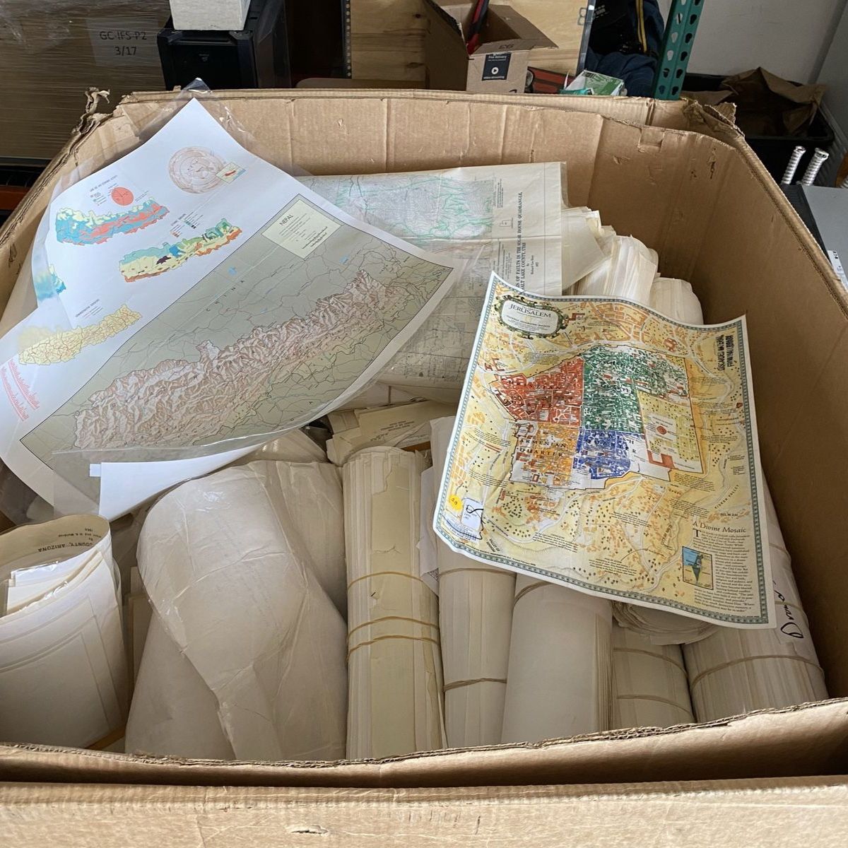 Pallet of old decommissioned maps