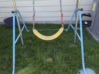 Metal Frame Single Child Swing Set with Yellow Seat Used and Gymnastics bar adjustable