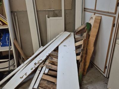 Scrap wood and some dried wood for carving, kindling, or firewood.