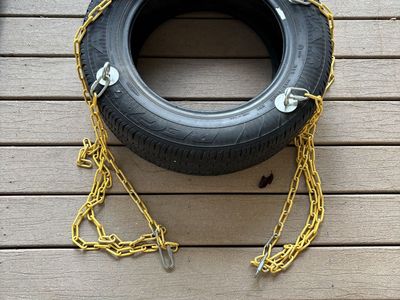 Tire Swing with Yellow Chains - Used, Great Condition, Ready for Fun!