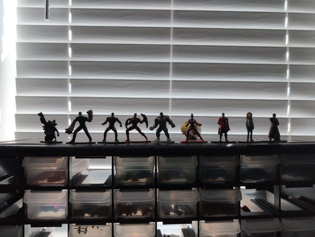 Marvel Superhero Figurine Set - Assorted Characters, Pre-Owned and also comes with three harry Potter ones to