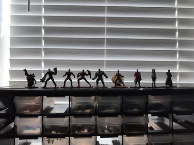 Marvel Superhero Figurine Set - Assorted Characters, Pre-Owned and also comes with three harry Potter ones to