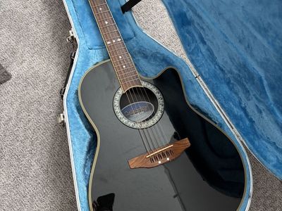 Ovation Celebrity Electric/Acoustic Guitar and hard case, black