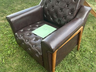 Brown faux leather accent chair