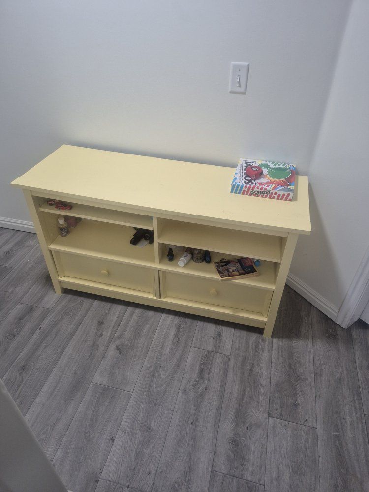 yellow tv stand