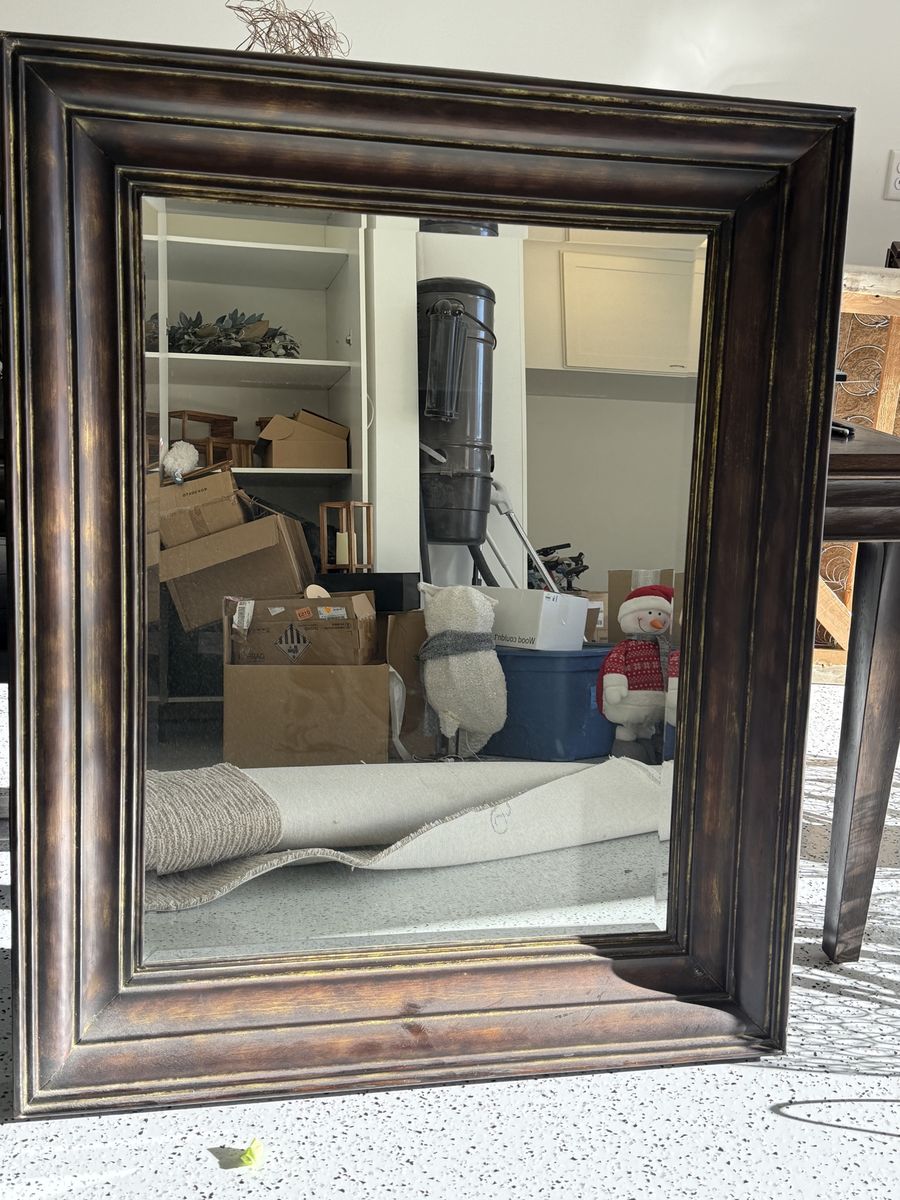 Large dark wood frame wall mirror