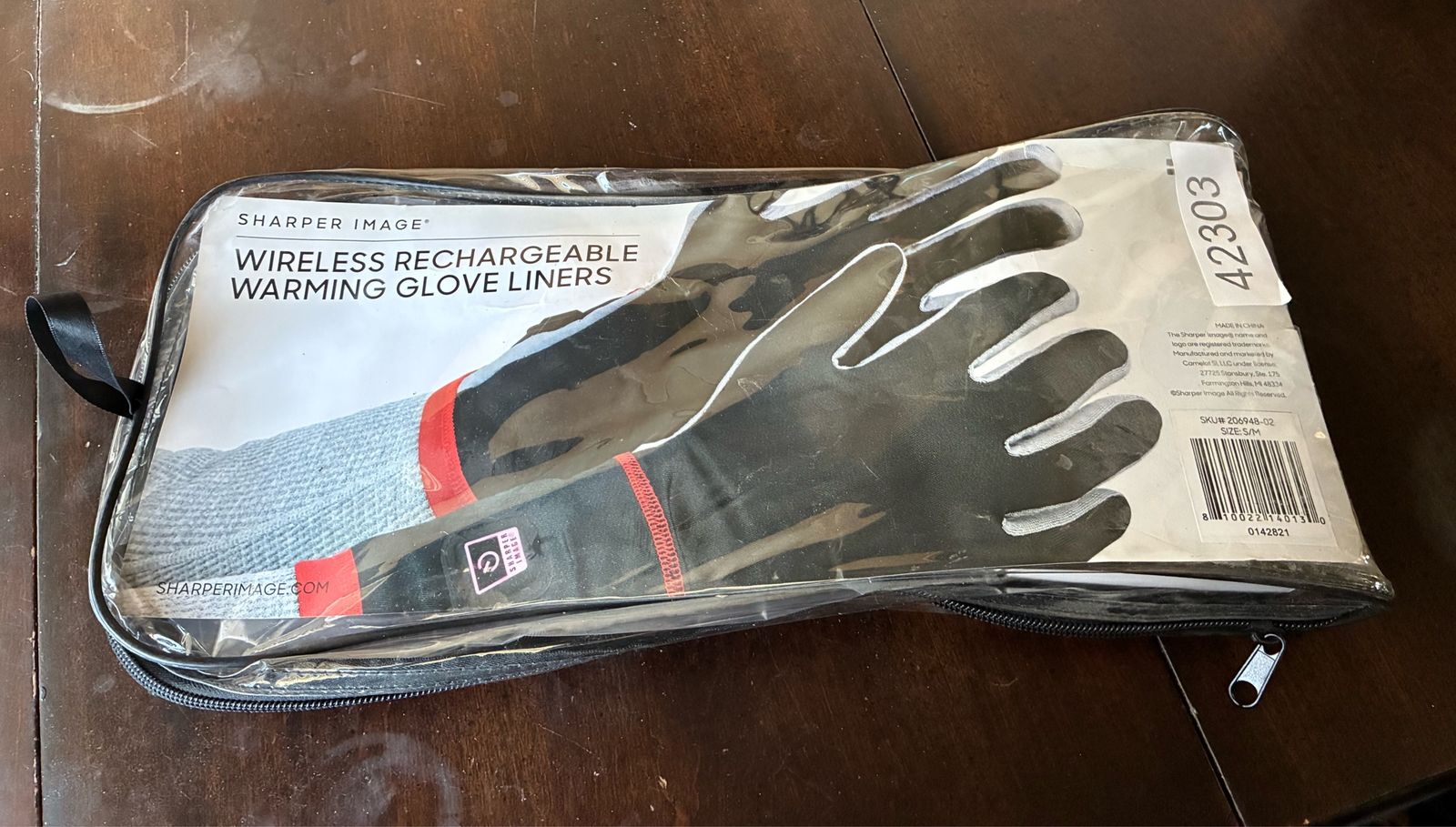 Brand new, Sharper Image Wireless Rechargeable Warming Glove Liners, size small/medium