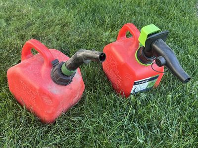 Set of 2 Used Red Plastic Gas Cans with Spouts