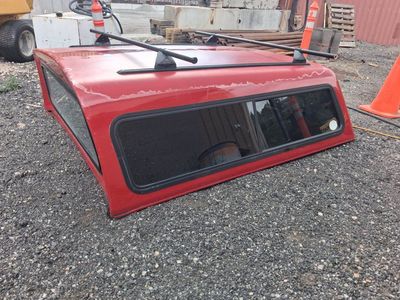 Red Truck Bed Cap/Camper Shell with Roof Rack