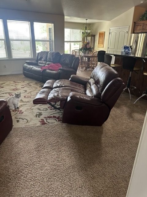 Leather reclining sofa set