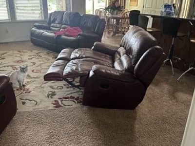 Leather reclining sofa set