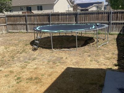 Used Outdoor Round Trampoline with Ladder - Great for Backyard Fun