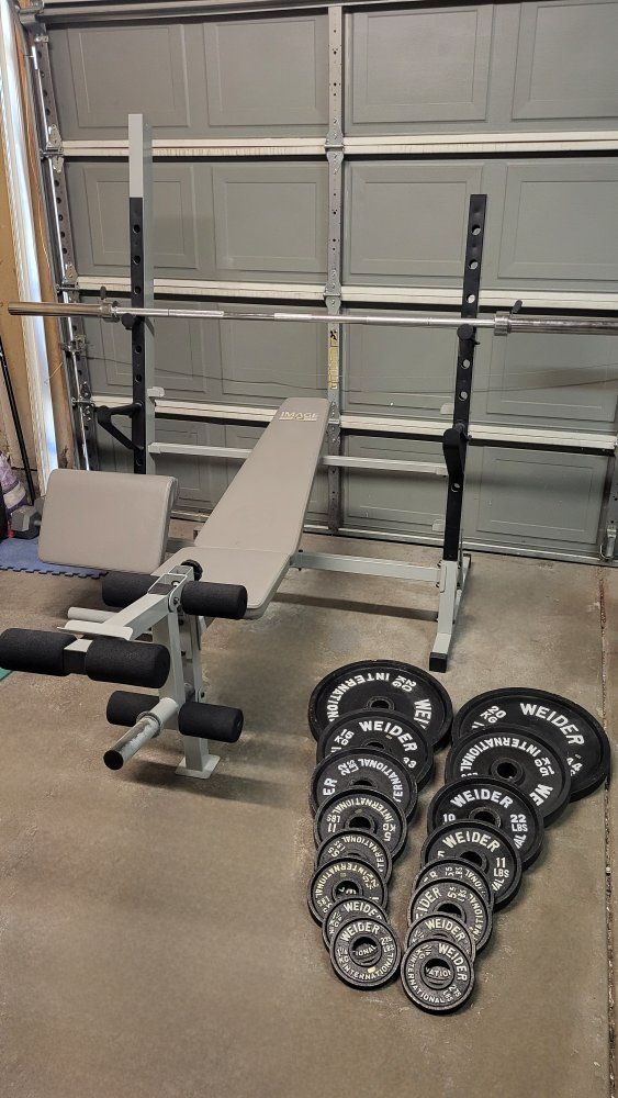 Bench and 253 pounds of weights