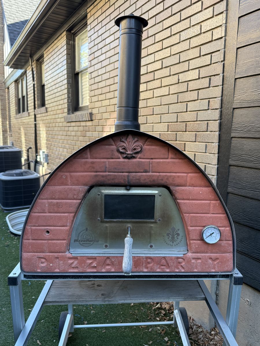 Portable wood-fired pizza oven imported from Italy