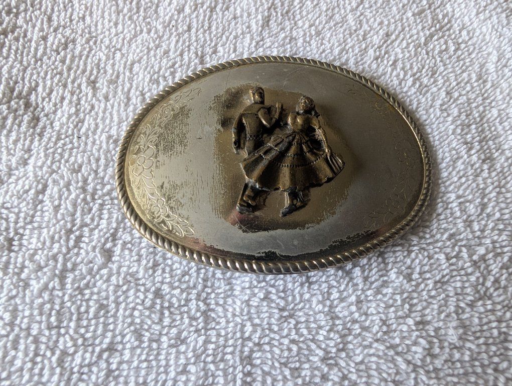 Vintage metal dancing belt buckle