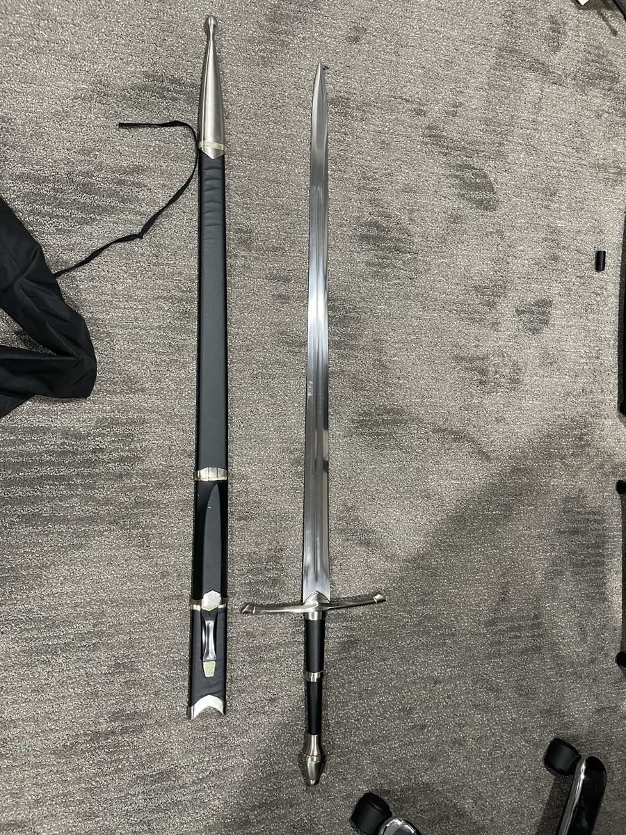 Two swords with 3 free knives