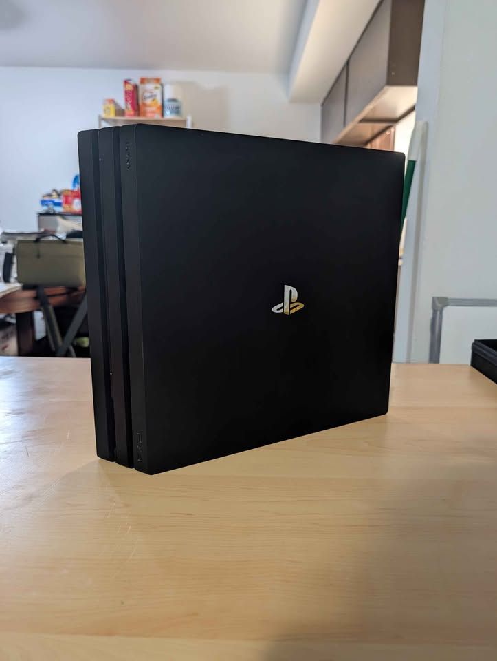 PS4 PRO 4k gaming console, with controller, like new.