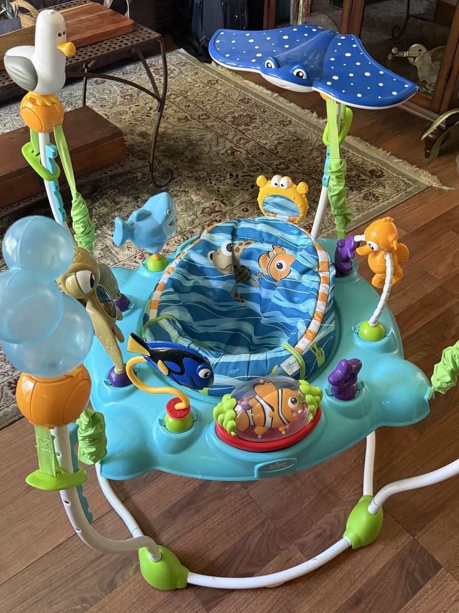 Finding Nemo Sea of Activities Jumper; collapsing, infant bath recliner; infant play mat; Bumbo baby seat/tray; nursing pillow