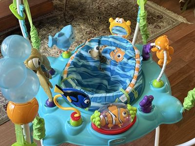 Finding Nemo Sea of Activities Jumper; collapsing, infant bath recliner; infant play mat; Bumbo baby seat/tray; nursing pillow
