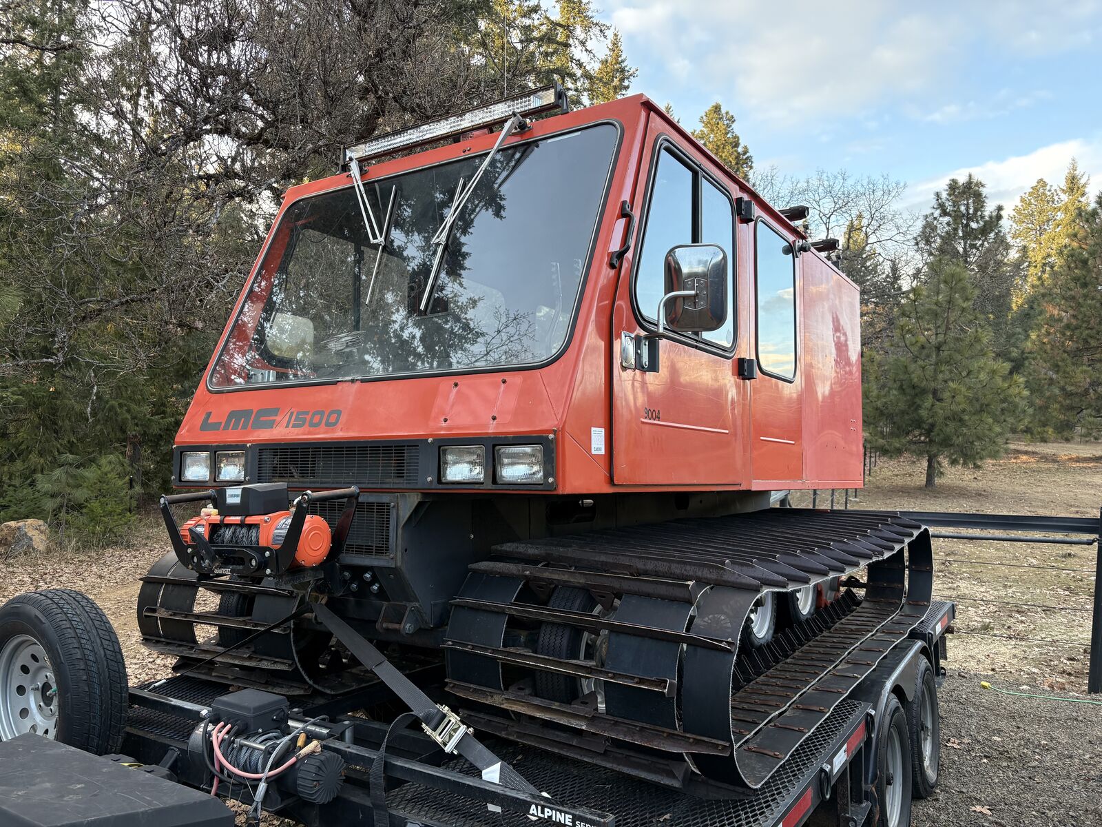 1987 LMC 1500 with AMC 258 CI (4 L) engine, crew cab, and rear storage box.