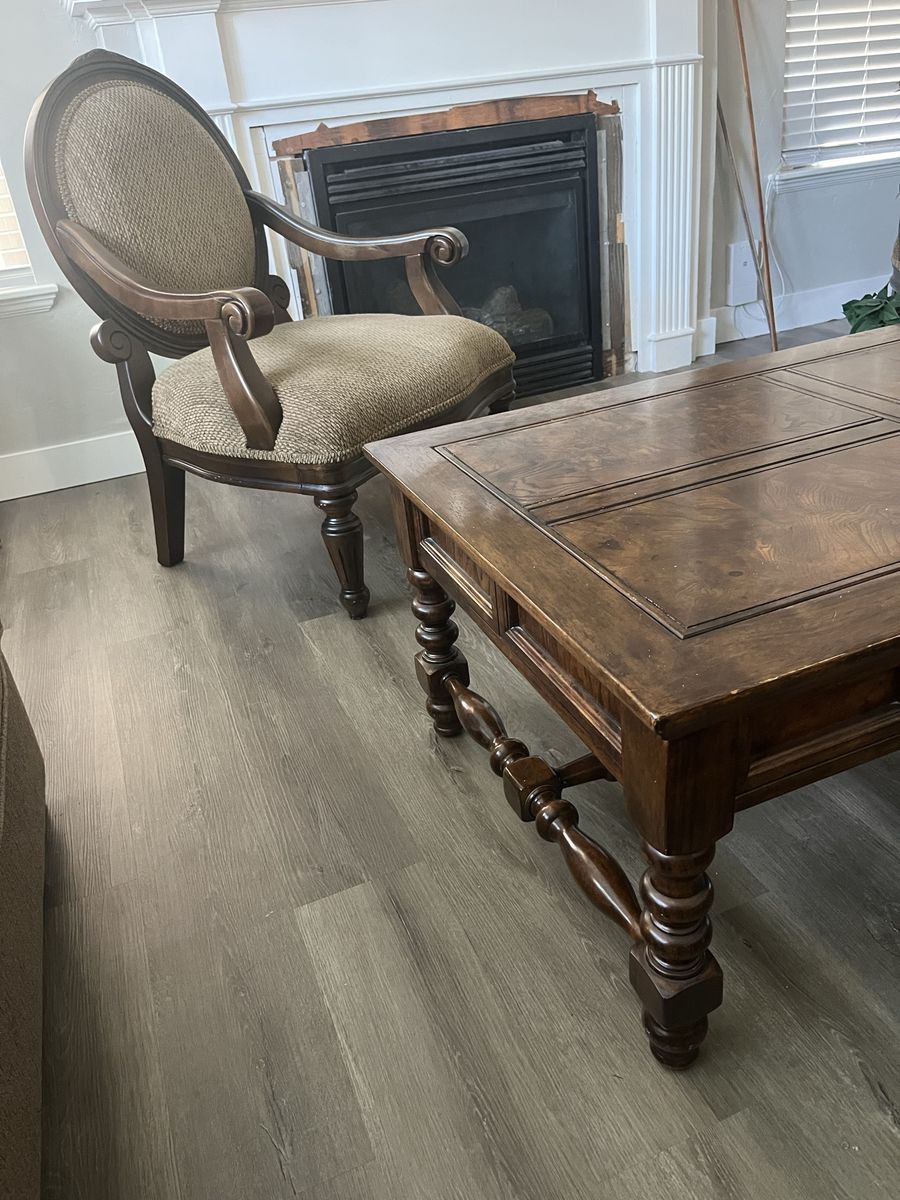 living room coffee table 50" x 30 x 19" tall with matching living room chair. $29 each