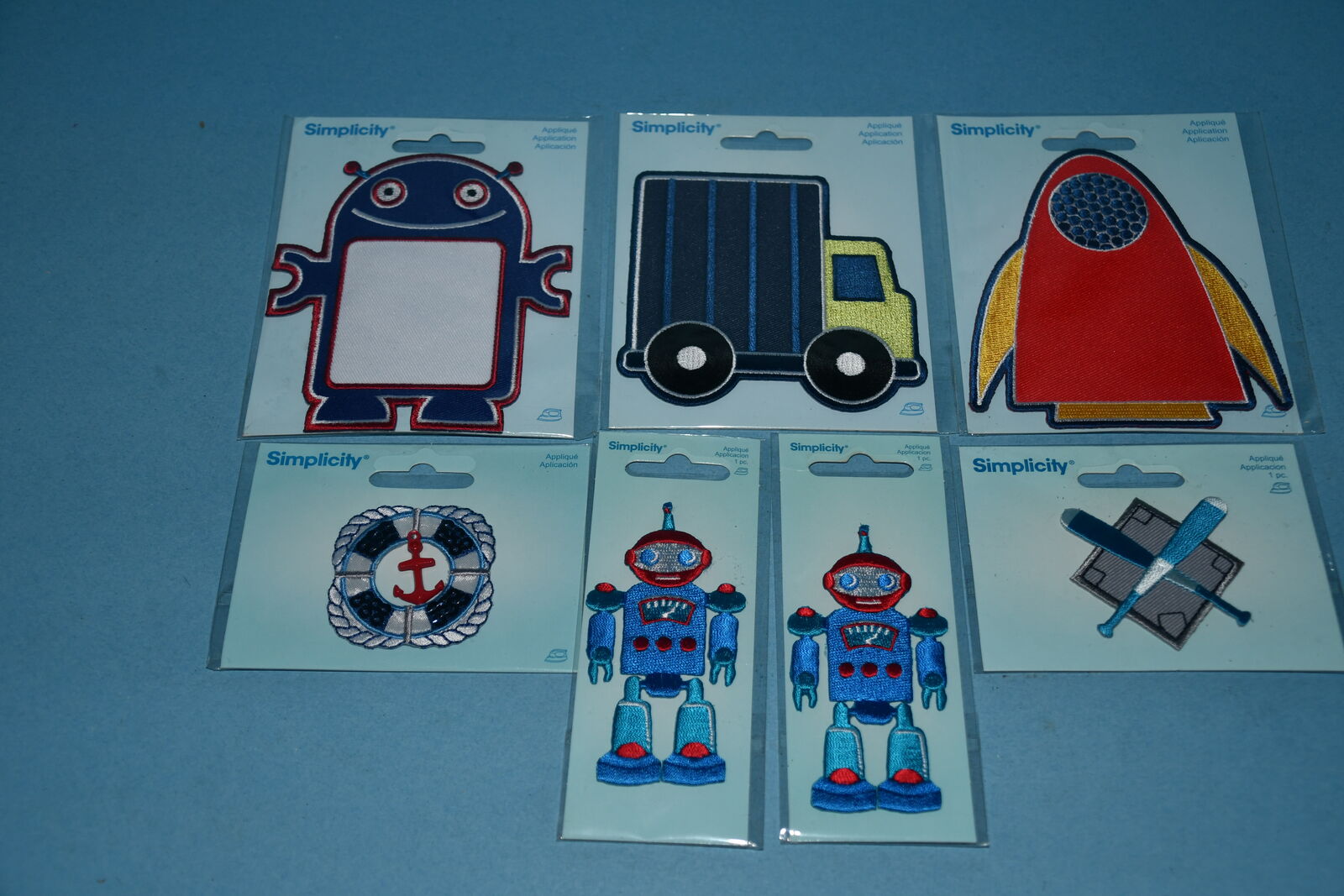 7 NEW SIMPLICITY APPLIQUES ~ ROCKET SHIP, ROBOTS, ANCHOR, BASEBALL, TRUCK ~ SEWING ~ CLOTHES, BACKPACKS.... ~ ALL FOR $5