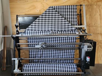 Fabric Measuring and Bolting Machine
