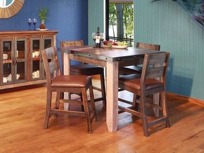 Multicolored pine dining table and 4 chairs as sold by RC Willey
