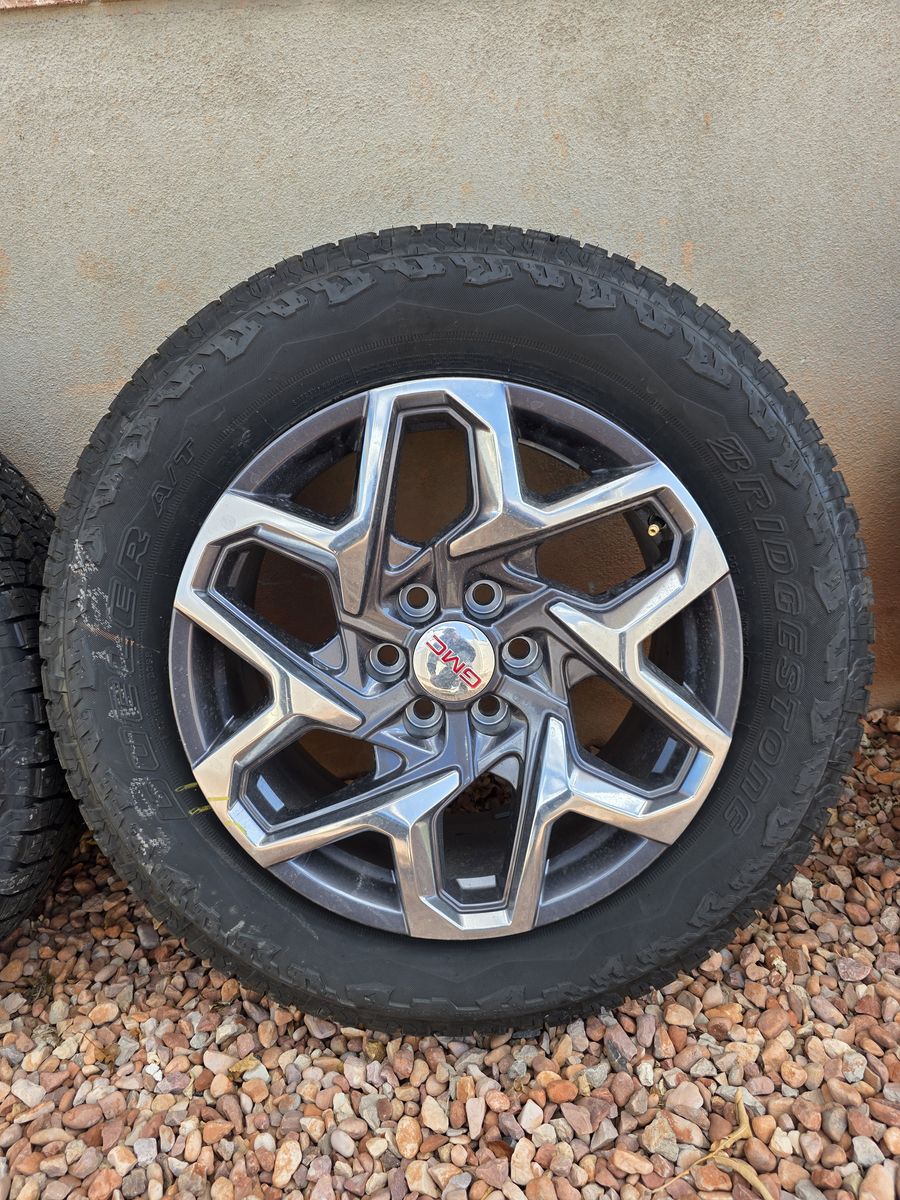 Brand new GMC wheels and tires