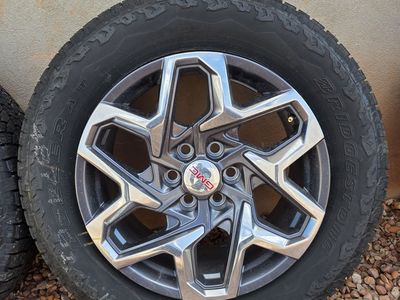 Brand new GMC wheels and tires