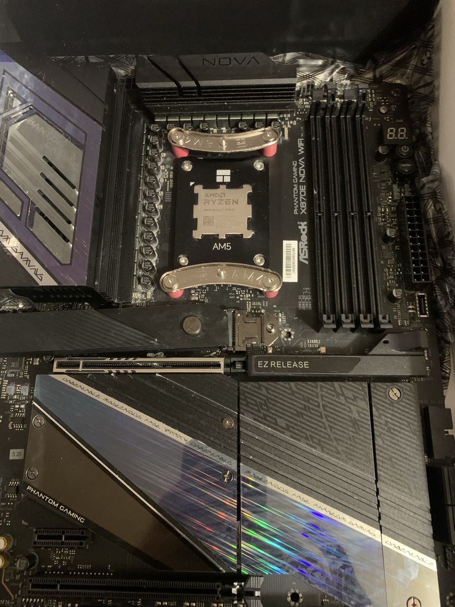 Sale or trade.  Make offer ASRock X870E NOVA WiFi Phantom Gaming Motherboard w/ AMD Ryzen 7 7700X CPU AM5 Socket