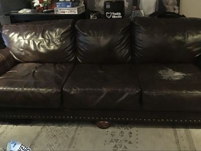 Dark Brown Vinyl Sofa with Nailhead Trim and Wear