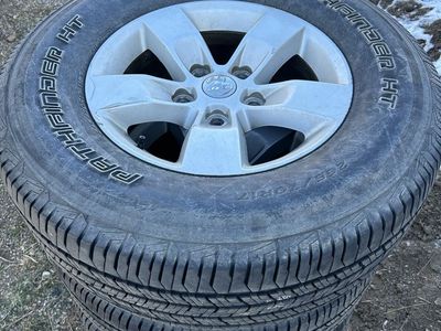 Stock 2014 ram 1500 wheels & tires 5x5.5