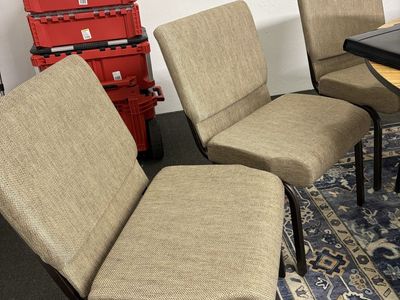 4 wide tan cushion chairs