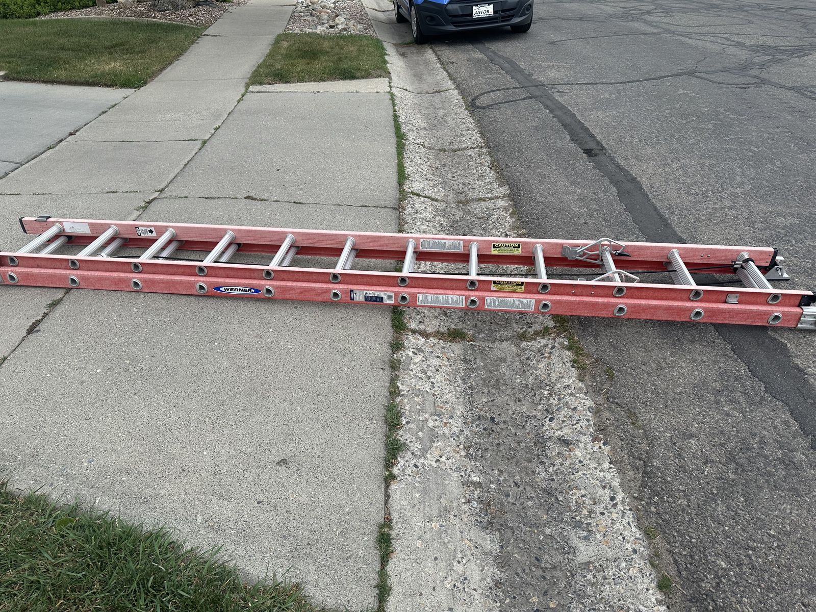 Werner D6224-2 24 ft. Fiberglass Extension Ladder (23 ft. Reach Height) with 300 lb. Load Capacity Type IA Duty Rating