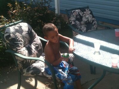 Outdoor Glass Patio Table + 4 Chairs – $60 OBO