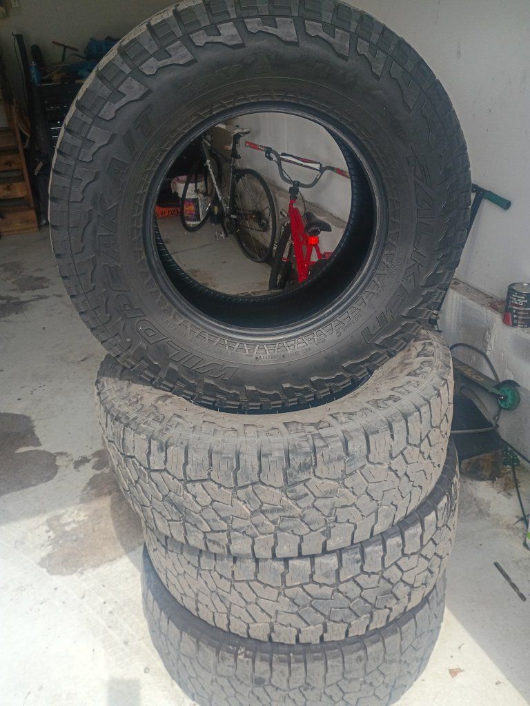 4 Falken Wildpeak A/T tires size LT285/70R17.
